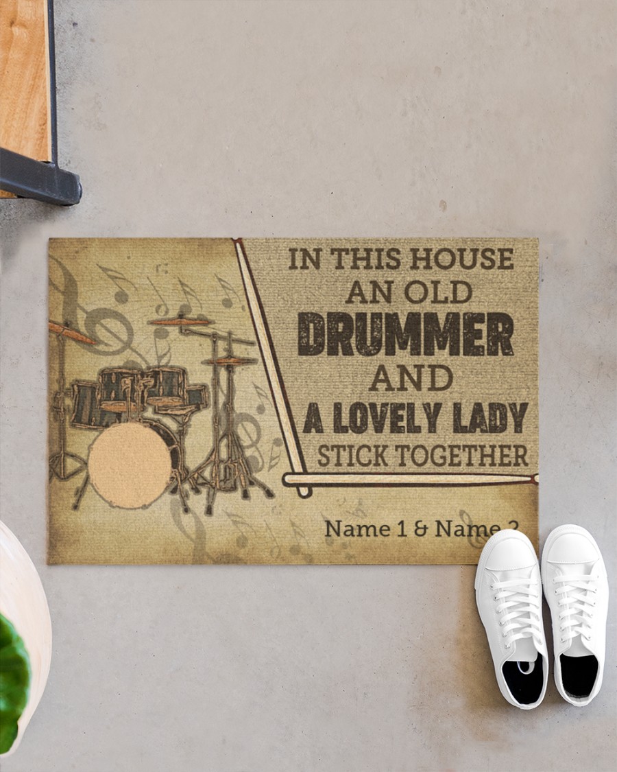 In this house an old drummer and a lovely lady stick together doormat 1