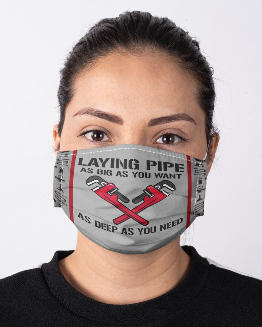 Plumber laying pipe as big as you want as deep as you need face mask